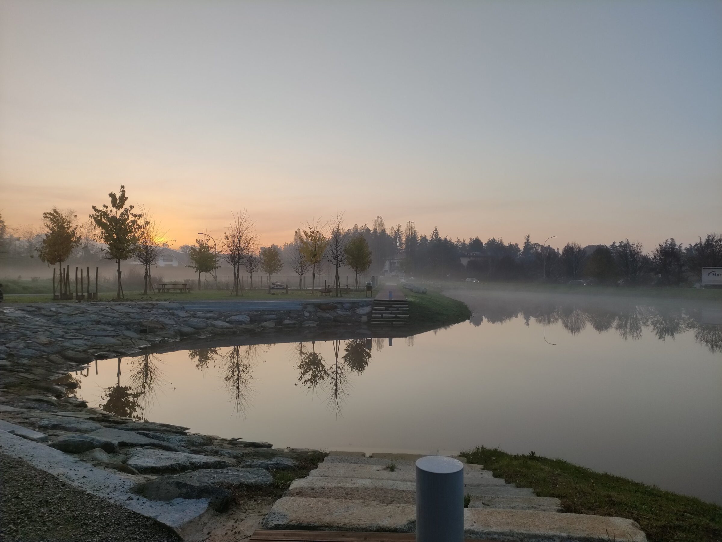 morning fog at retention basin arcore