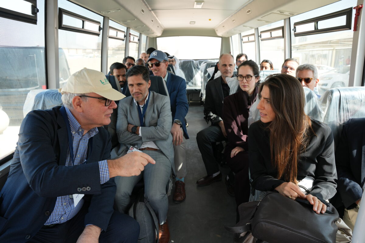 a group of people sitting in a bus
