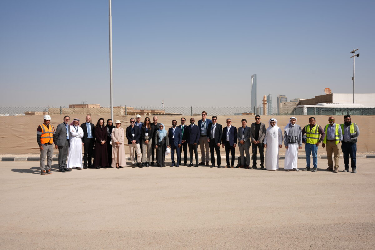 a group of people standing at a construction site