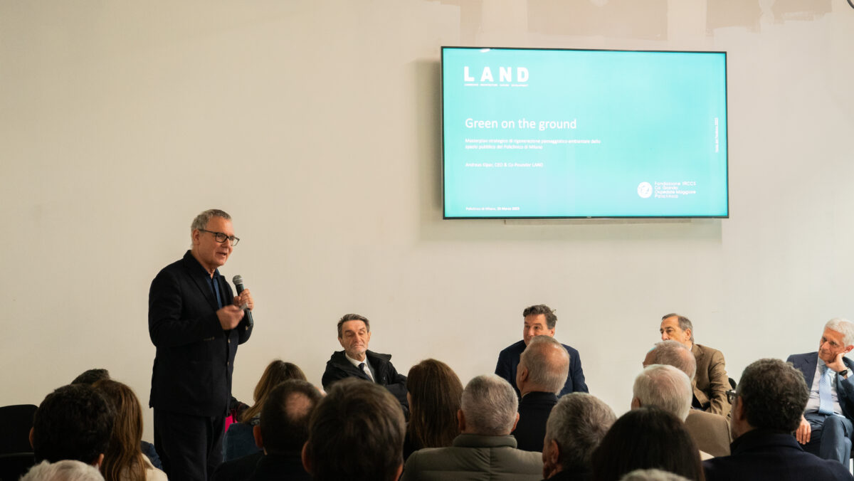 a man presenting slides to an audience