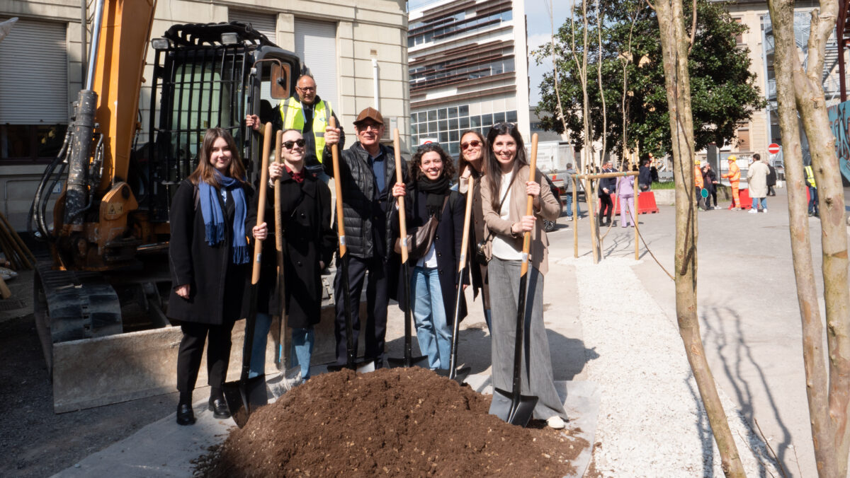 a group of people shovel in hand