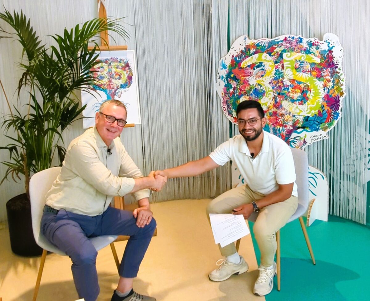 two men holding hands