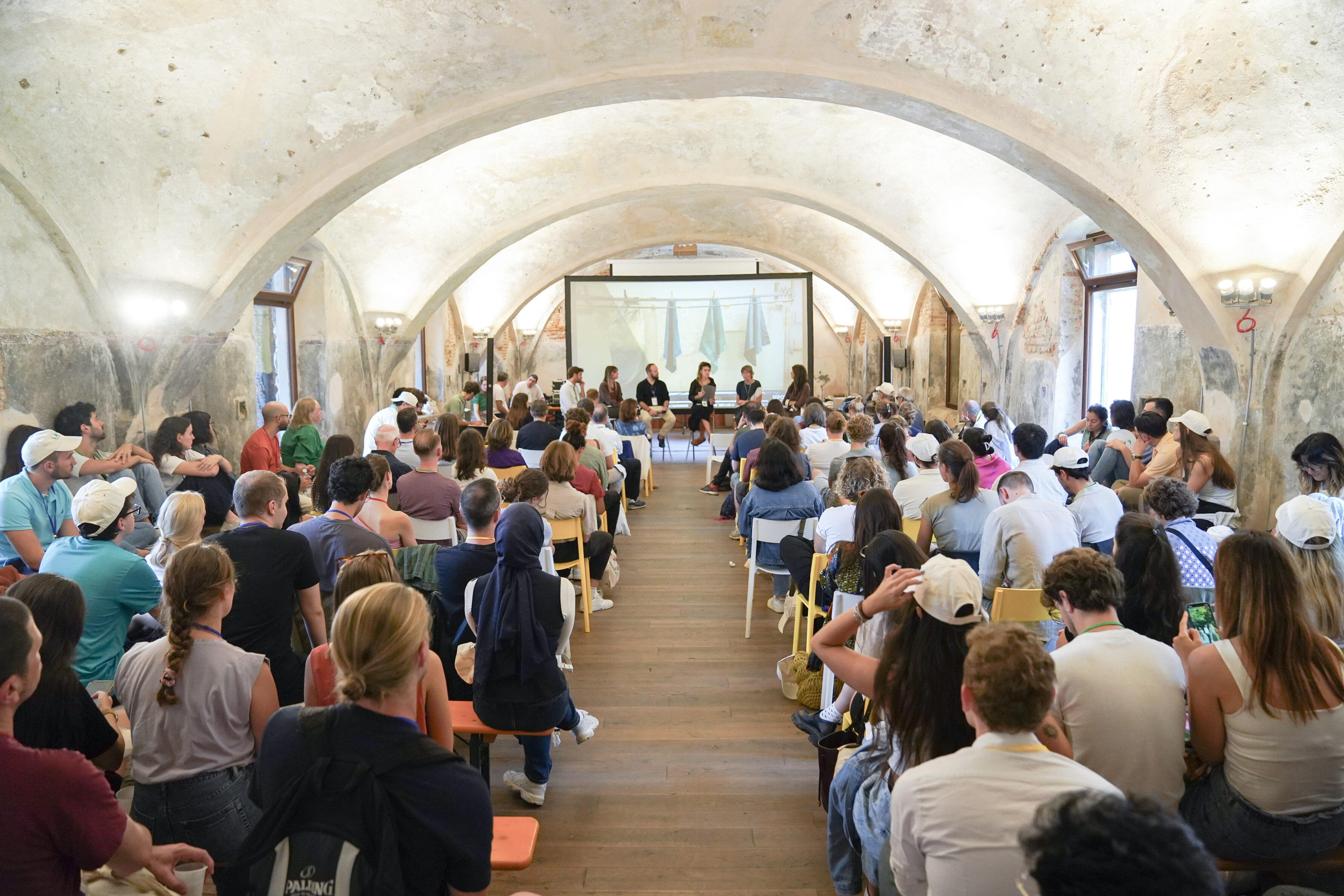 a group of people attending a meeting